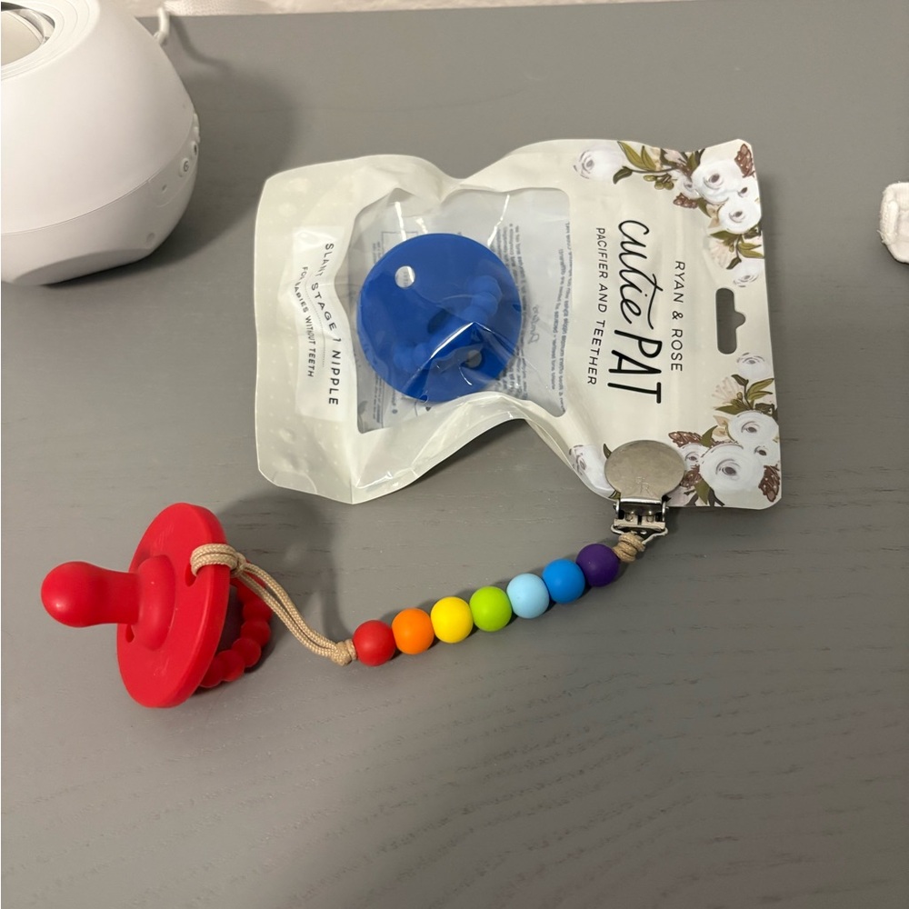 Ryan and Rose pacifier and clip lot